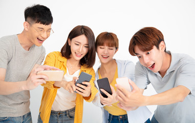 happy young student people watching the  smartphones
