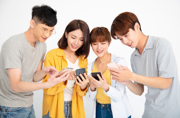 happy young student people watching the  smartphones