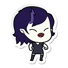 sticker of a cartoon laughing vampire girl