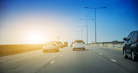 Car driving on highway  road,Car parked on road and Small passenger car seat on the road used for daily trips