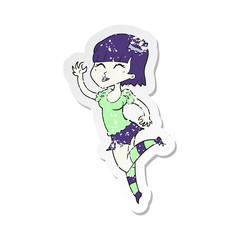 retro distressed sticker of a cartoon vampire girl