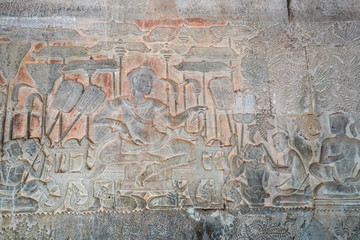 Relief of the king Suryavarman II on the wall of gallery of Angkor Wat temple