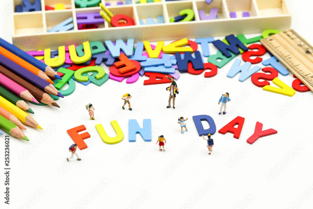 Wall mural miniature people : children and friend funny and enjoy together using for concept of fun day.