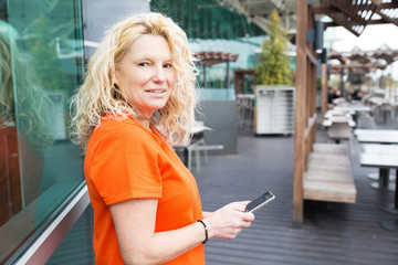 Positive tourist using mobile app