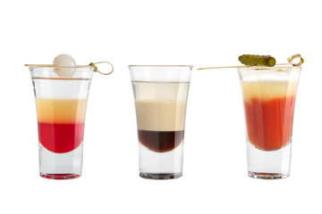 Popular alcohol shots on a white background. Three shots strong alcohol.