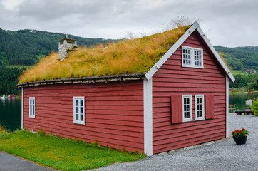 Fototapeta na wymiar Typical wood house in the Norwegian village Kaupanger