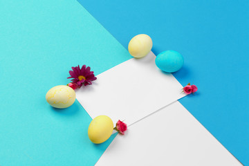 Easter eggs in blue colors. The place for the text on the paper