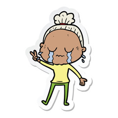 sticker of a cartoon crying old lady