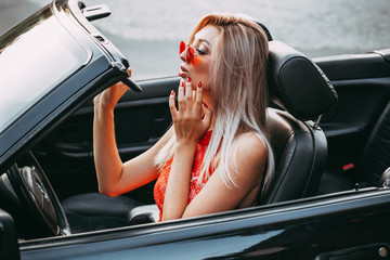 young woman in car
