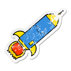 distressed sticker of a cartoon rocket