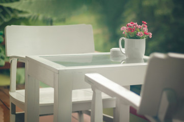 Soft focused coffee table and chairs set, graceful soft mood