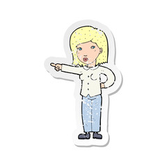 retro distressed sticker of a cartoon woman pointing