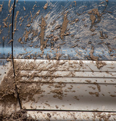 Dirt on the body from the car as a background