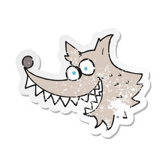 retro distressed sticker of a cartoon crazy wolf