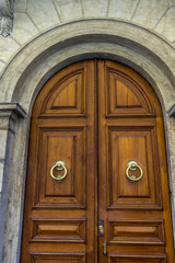 Italy, Rome, Roman Forum, a clock on top of a wooden door