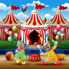 Cartoon clown show and acrobat performance at the arena