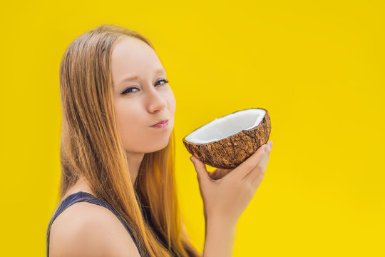 Young Woman Doing Oil Pulling Over Yellow Background