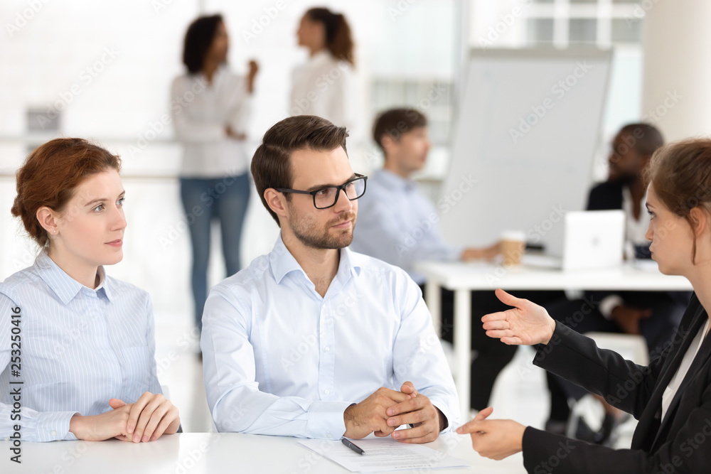 Wall mural candidate for vacancy in company answers questions during an interview