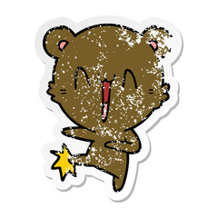 distressed sticker of a happy bear kicking cartoon