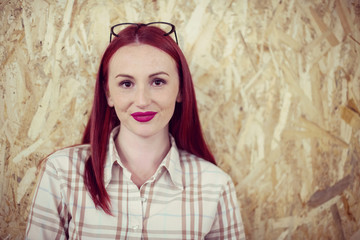 portrait of young redhead business woman