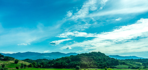 Italy, Rome to Florence train, a body of water with a mountain in the background