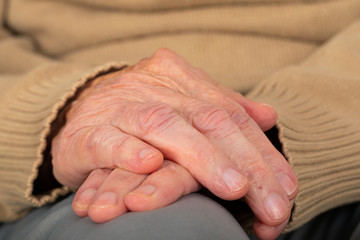 Elderly shaking hands