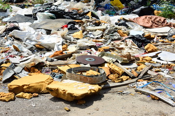 Plastic waste piles and from households and communities Have been left in the forest area Along the main road