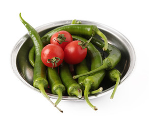 tomato and green pepper on white background