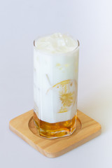 Honey milk on white background.