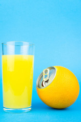 Orange juice on blue background