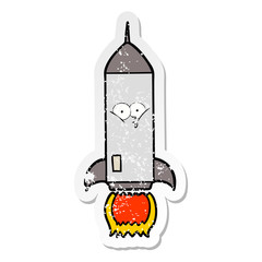 distressed sticker of a cartoon rocket