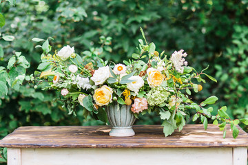 Wedding decor. fresh flowers in a vintage vase, flowers bouquet