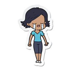sticker of a cartoon girl crying