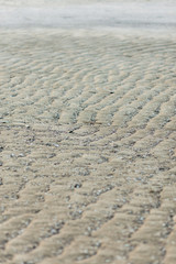 Fototapeta na wymiar beautiful texture ,wavy sand on the ocean