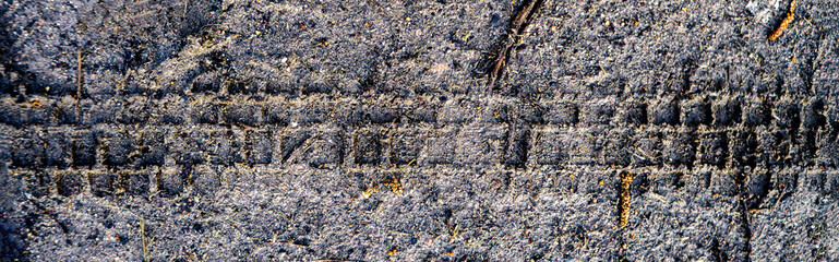 Reifenspuren im Sand, Strukturen und Muster