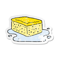 retro distressed sticker of a cartoon sponge