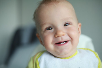 Happy little boy after having a lunch