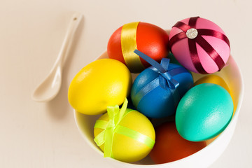easter eggs on white wooden desk