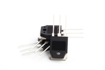 Electronic transistors  isolated on white background macro shot