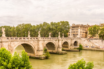 Naklejka premium Rome, Italy. View of famous Sant' Angelo Bridge. River Tevere