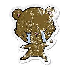 distressed sticker of a crying cartoon bear