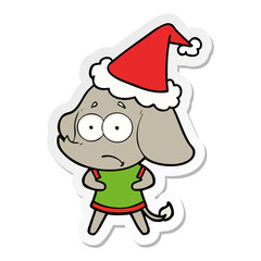 sticker cartoon of a unsure elephant wearing santa hat