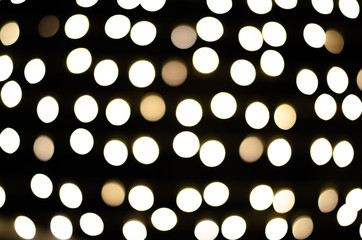 Round bokeh lights on Christmas night on the background