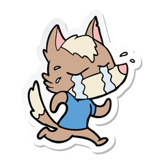 sticker of a cartoon crying wolf running away