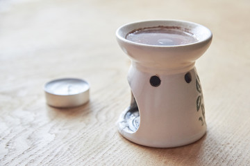 Aroma lamp with essential oil, candle, aromatherapy