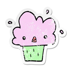 distressed sticker of a cartoon cupcake