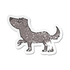 retro distressed sticker of a cartoon dog