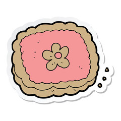 sticker of a cartoon biscuit