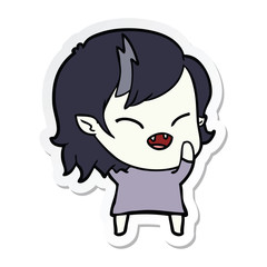 sticker of a cartoon laughing vampire girl