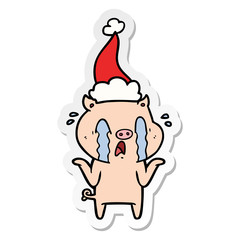 crying pig sticker cartoon of a wearing santa hat